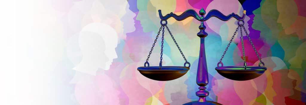 Colorful illustration showing a crowd of diverse people with a set of law scales on top of the image. 